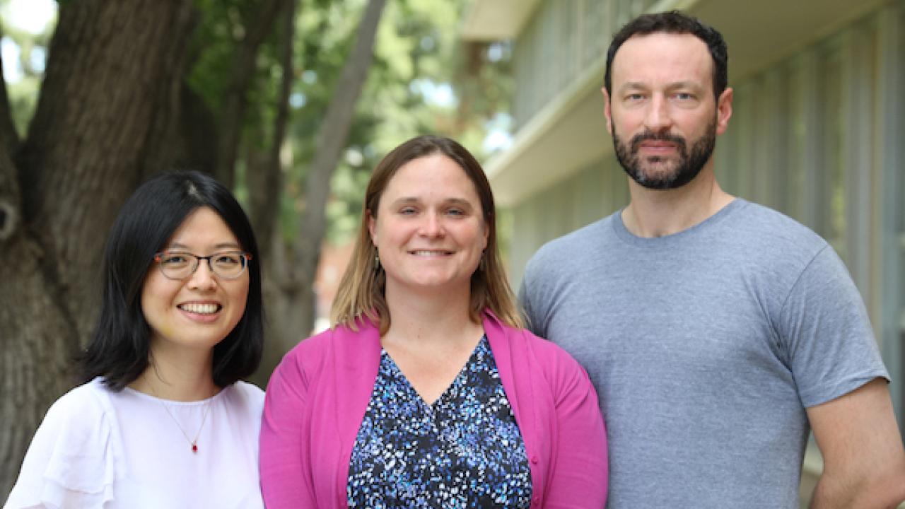 Xiaoli Dong and Frances C. Moore, who are both assistant professors in the Department of Environmental Science and Policy at UC Davis, with Marc N. Conte, an associate professor in the Department of Economics at Fordham University, outside Wickson Hall at UC Davis. (UC Davis Photo)