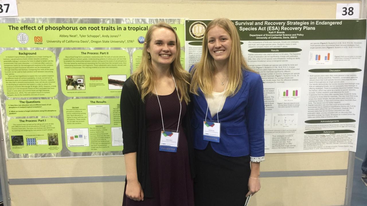 Abbey Neat and Kaili P. Brande presenting research posters