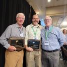 Professor Jim Sanchirico is pictured in the middle along with the other award recipient Jim Wilen 